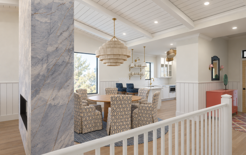 A bright open-plan interior with a round wooden dining table and six patterned chairs beneath a tiered woven pendant light, framed by a tall marble fireplace column in the foreground. White beadboard walls, light wood floors, and a compact kitchen create a layered, airy setting that suits AI in my design work. Home Design, Rendering, Annilee Waterman, Dallas Texas