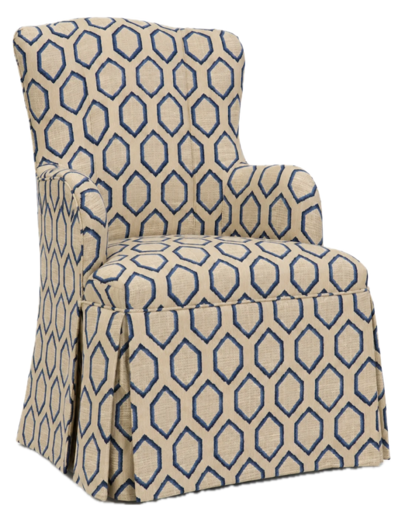 A beige upholstered wingback chair with a blue geometric lattice pattern, shown with a matching skirted seat and side panels. Centered against a white background, it has a tailored fabric texture and a clean, product-photography look, fitting AI in my design work. Home Design, Rendering, Annilee Waterman, Dallas Texas